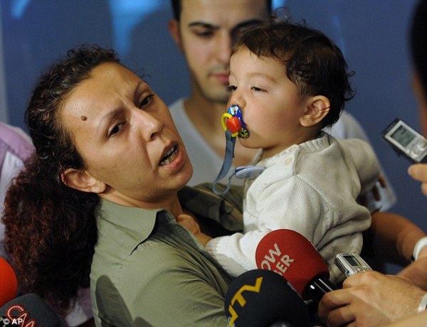 Nilufer Cetin, a Turkish aid volunteer, returns home with her one-year-old son after being one of the first to be deported by Israel. Nilufer Cetin, a Turkish aid volunteer, returns home with her one-year-old son after being one of the first to be deported by Israel.