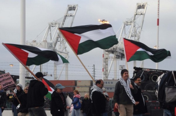 Dockers and activists stop the unloading of an Israeli ship in San Francisco, June 2010